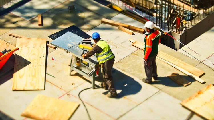 Men working on roofing Construction